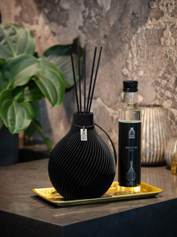 ICONIC HOME Sphere fragrance vase in deep black with signature room fragrance